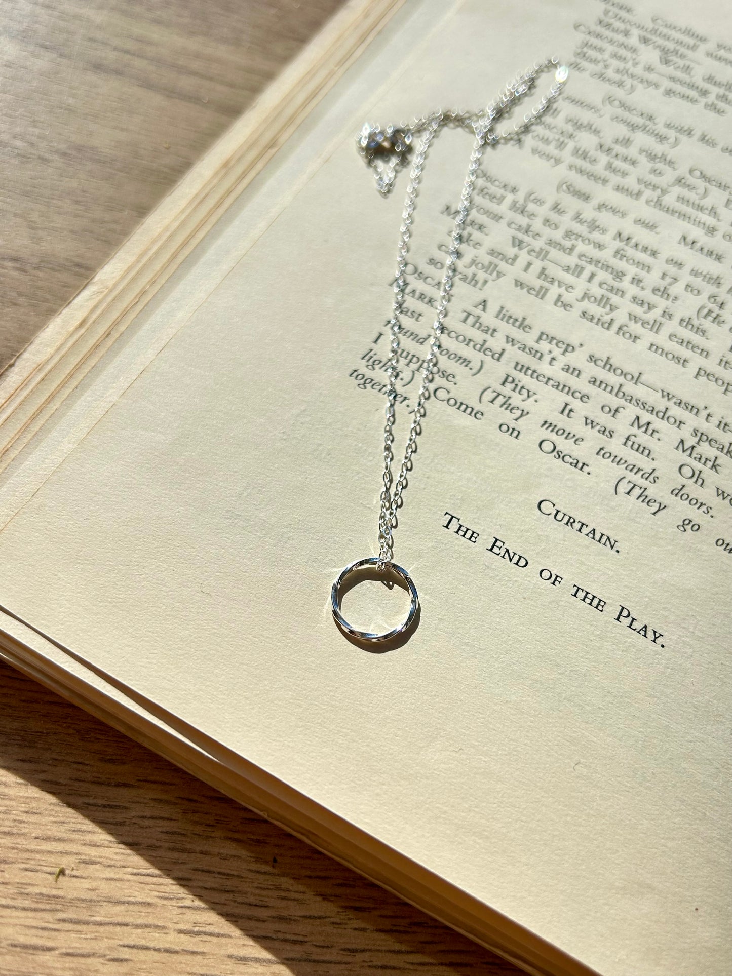 Twisted circle necklace