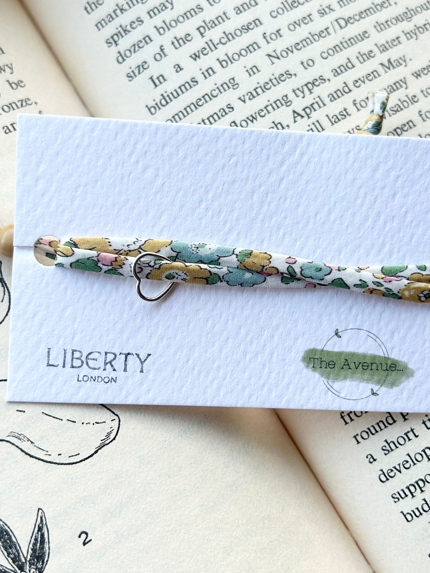 Fabric bracelet Betsy Ann yellow open heart charm