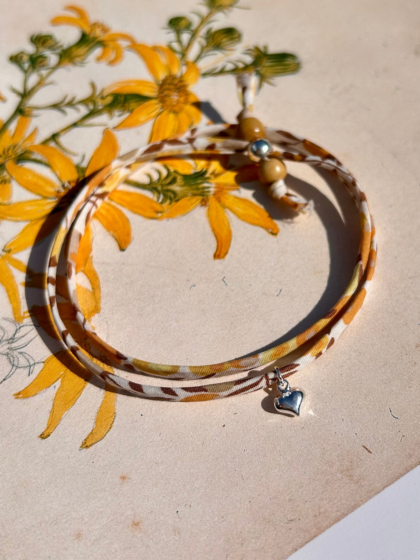 Fabric bracelet…Liberty of London Sunflower yellow (solid heart)