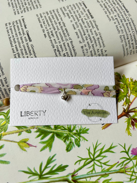 Fabric Bracelet – 
Liberty of London Betsy Lilac Light Iridescent - Sterling Silver solid heart charm