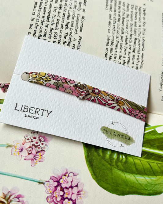 Fabric Bracelet – 
Liberty of London Margaret Annie Raspberry Gold Sterling Silver open heart Charm