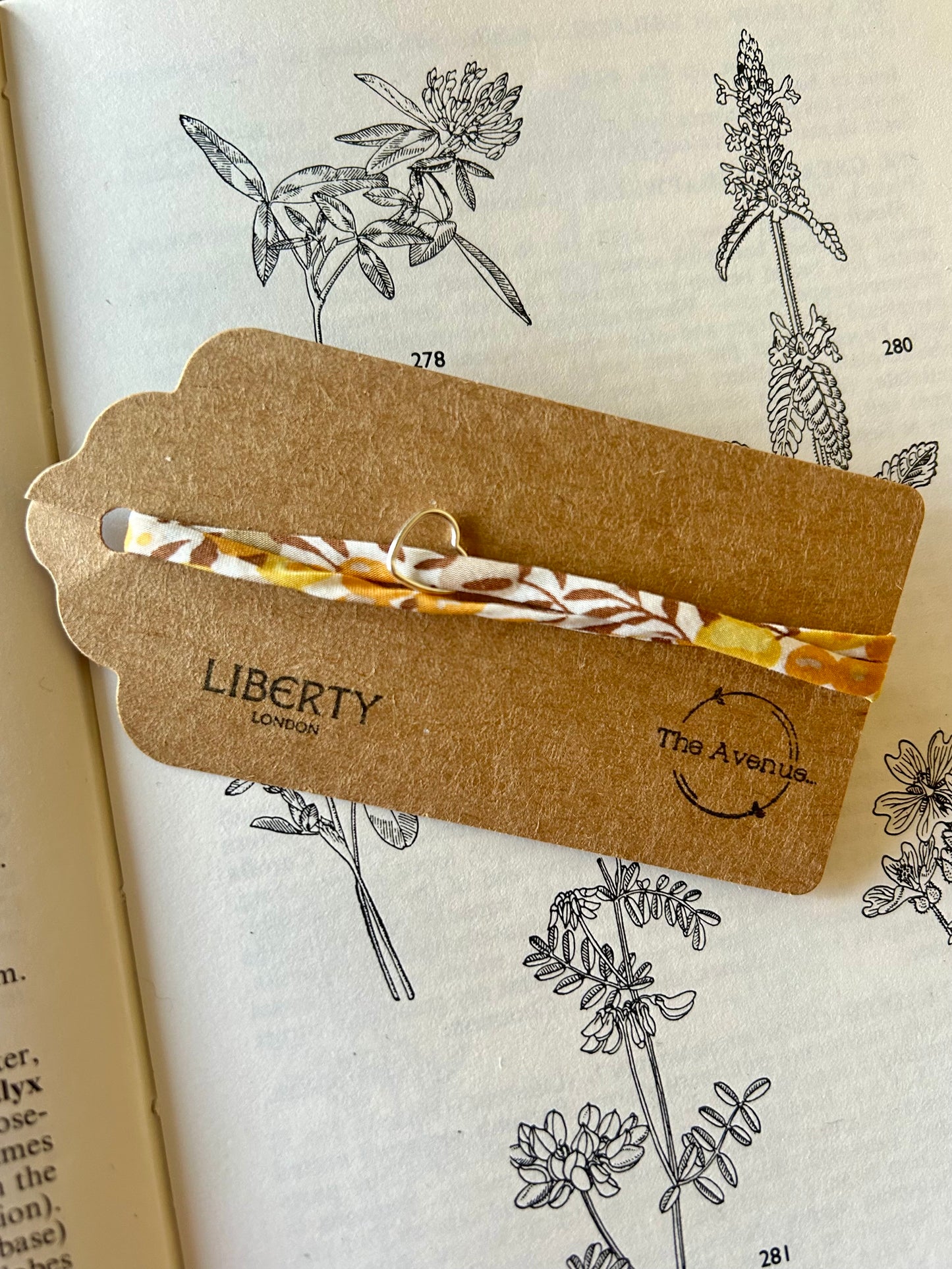 Fabric bracelet…Liberty of London Sunflower yellow (open heart)
