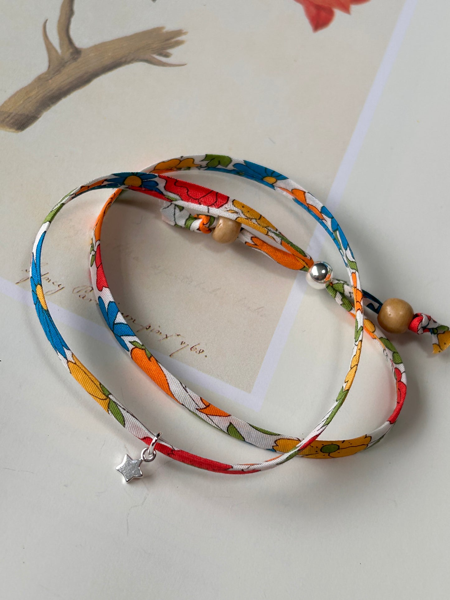 Fabric bracelet…Liberty of London Poppy and Daisy (solid star)