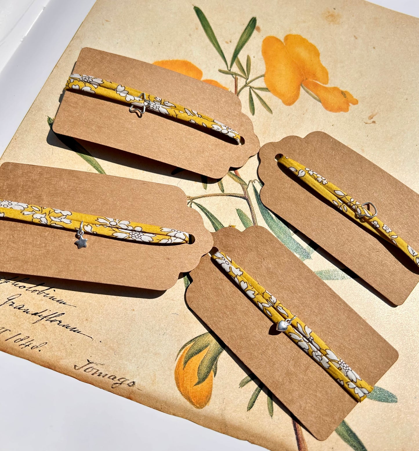 Fabric bracelet…Liberty of London yellow floral (solid heart) Capel Safran