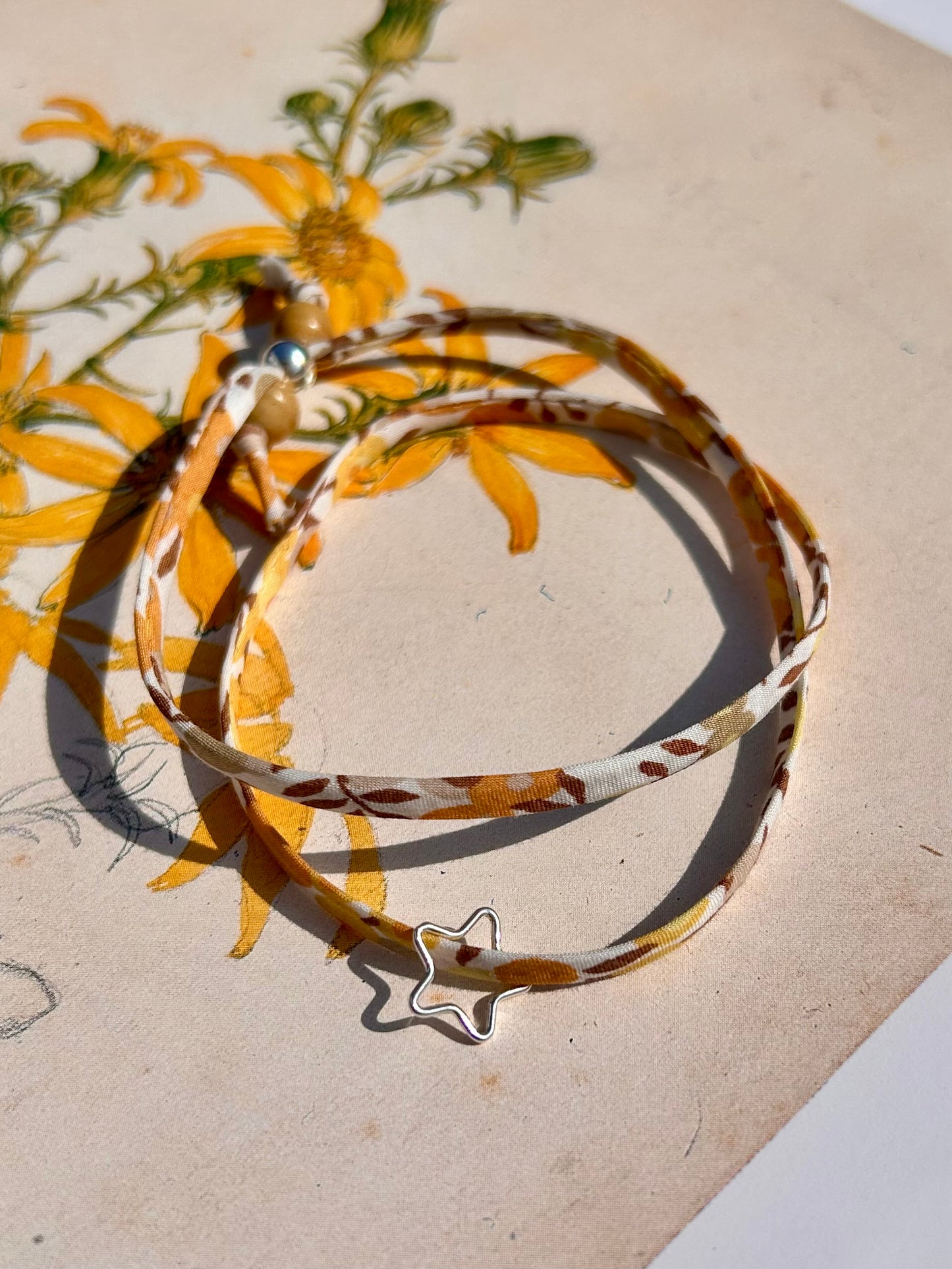 Fabric bracelet…Liberty of London Sunflower yellow (open star)
