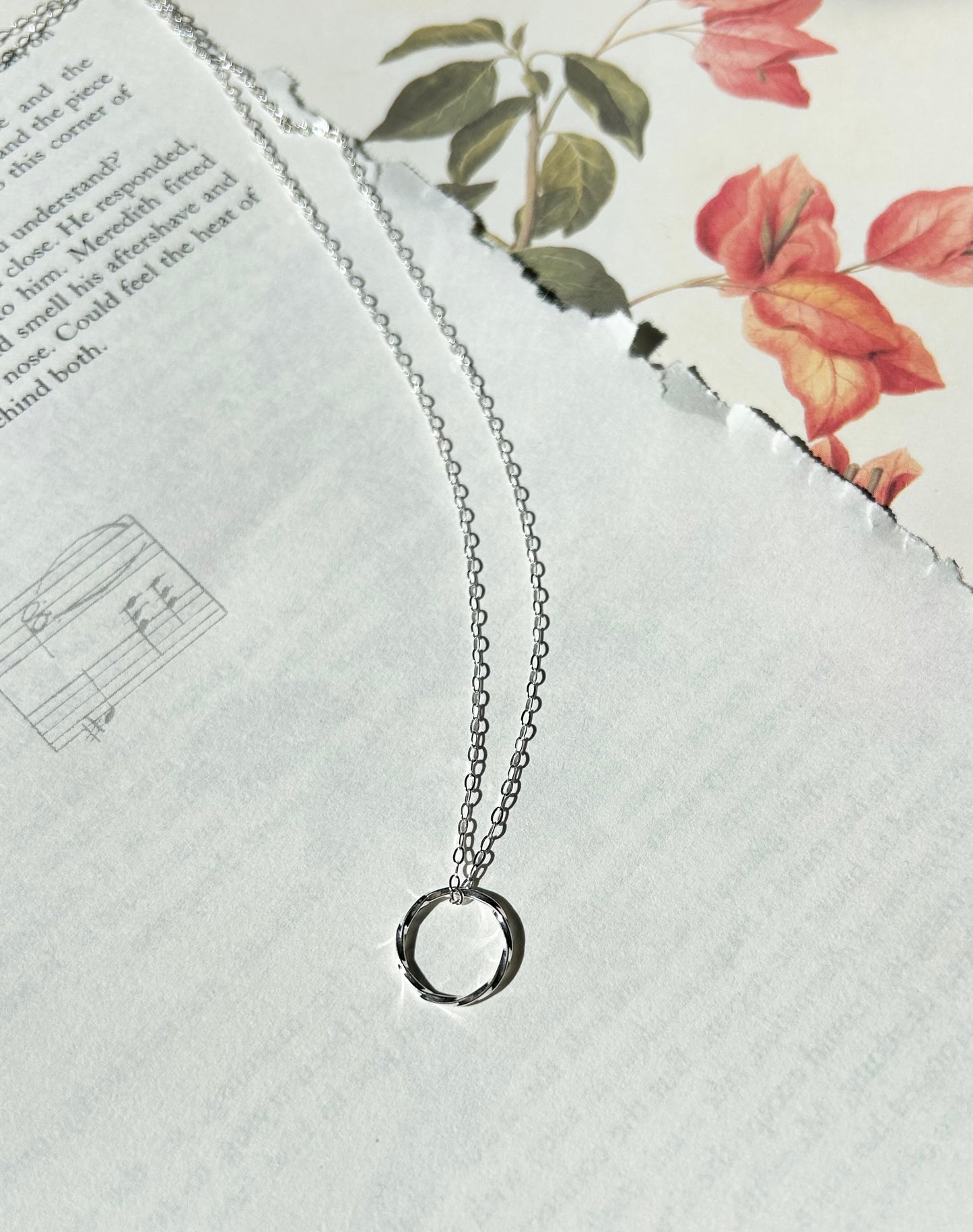 Twisted circle necklace