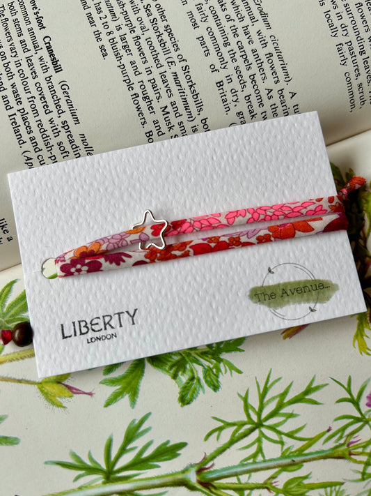 Fabric Bracelet – 
Liberty of London Margaret Annie Hibiscus Sterling Silver Open Star Charm