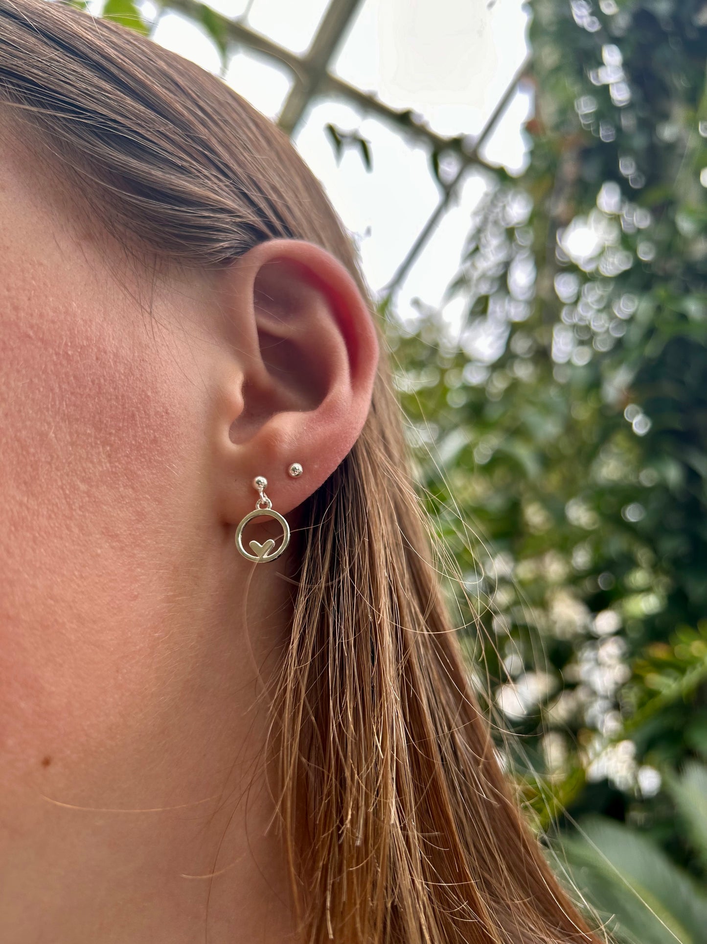 Heart in circle dangly stud earrings