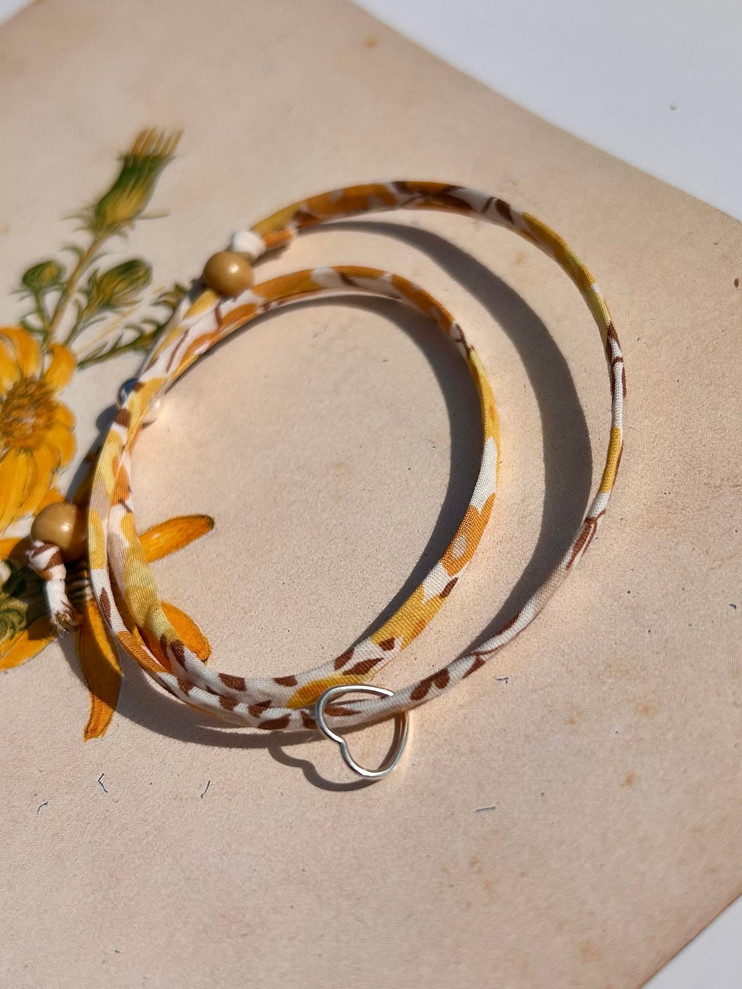 Fabric bracelet…Liberty of London Sunflower yellow (open heart)