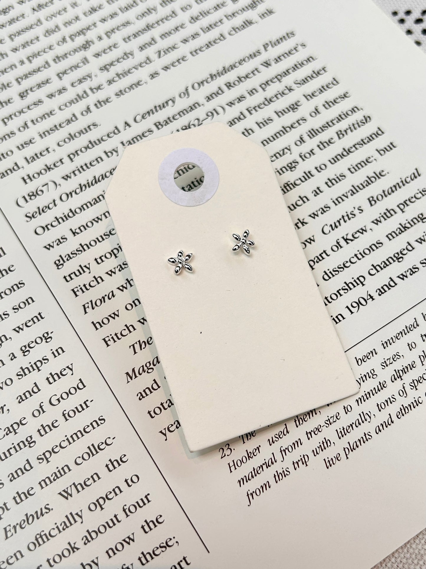 Tiny flower sterling silver stud earrings