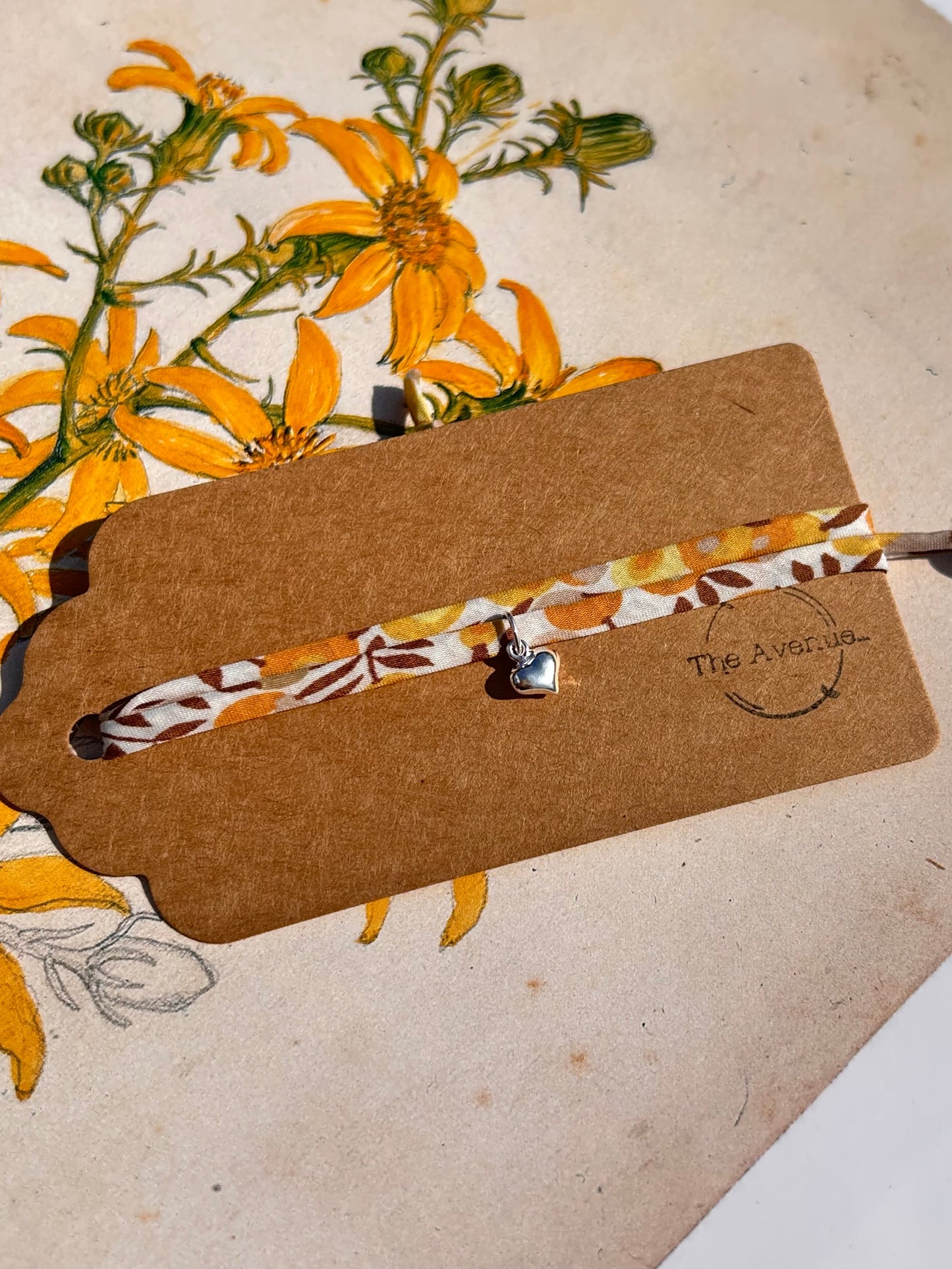 Fabric bracelet…Liberty of London Sunflower yellow (solid heart)