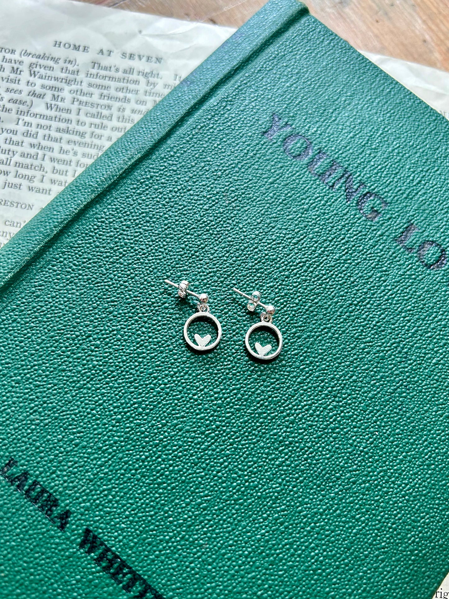 Heart in circle dangly stud earrings