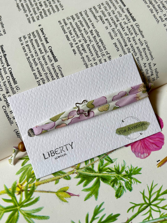 Fabric Bracelet – 
Liberty of London Betsy Lilac Light Iridescent - Sterling Silver open star charm
